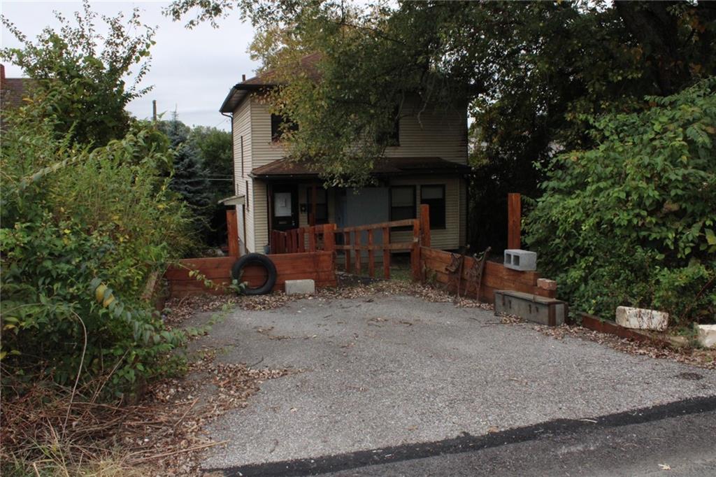 4020 Davis Avenue Homestead, PA 15120 - Photo 46 of 46 a front view of a house with a yard