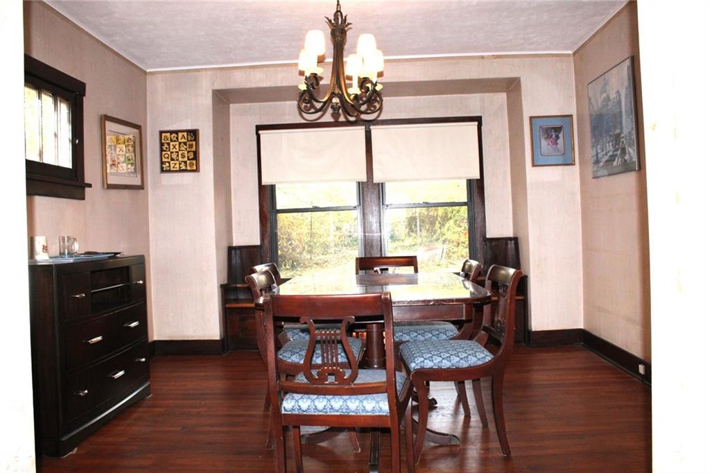 4020 Davis Avenue Homestead, PA 15120 - Photo 8 of 46 a view of a dining room with furniture window and wooden floor