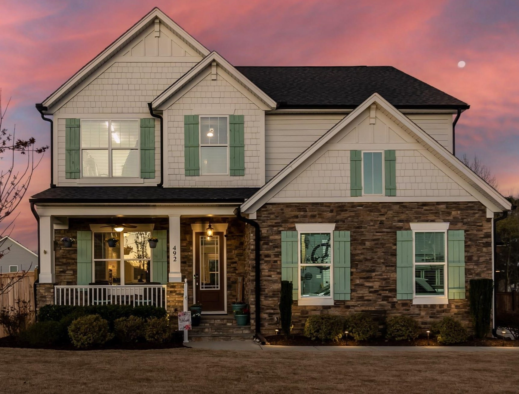 492 Adkins Ridge Road Rolesville, NC 27571 - Photo 1 of 14 a front view of a house with a yard
