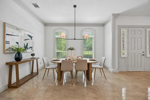 a view of a dining room with furniture window and outside view