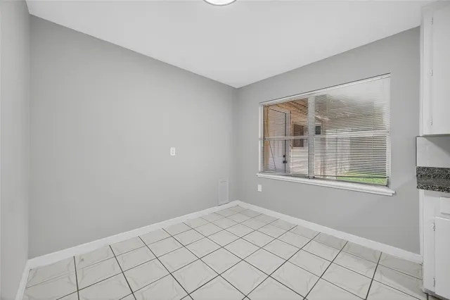 a view of an empty room with window