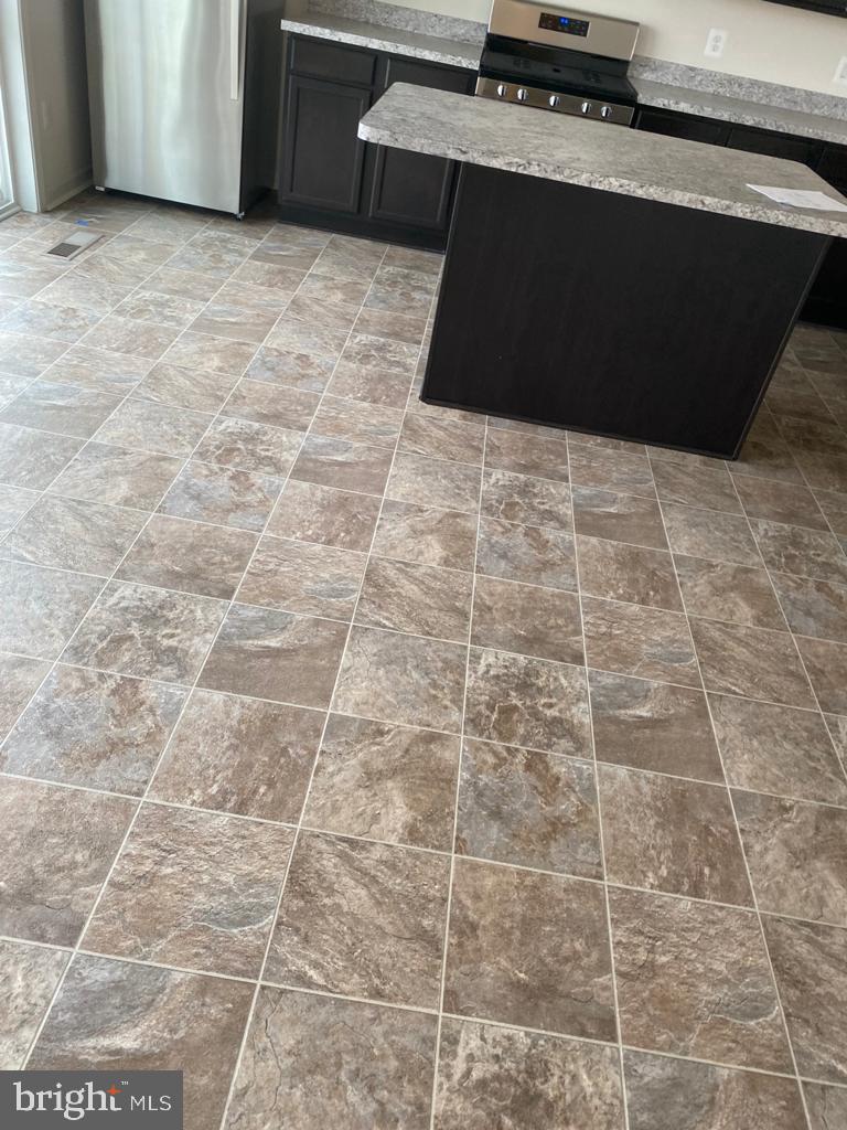 121 Lindy Way Stephenson, VA 22656 - Photo 22 of 23 a view of a refrigerator