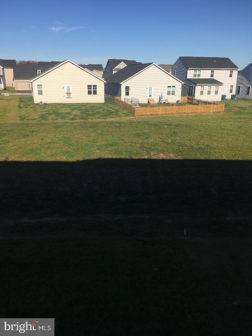 121 Lindy Way Stephenson, VA 22656 - Photo 5 of 23 a view of a big yard with an outdoor space