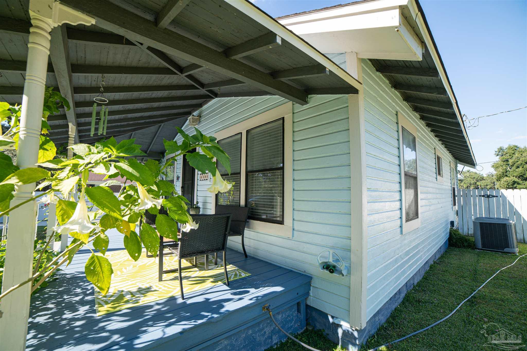 5750 Turkey Road Pensacola, FL 32526 - Photo 4 of 22 a view of backyard with a potted plant