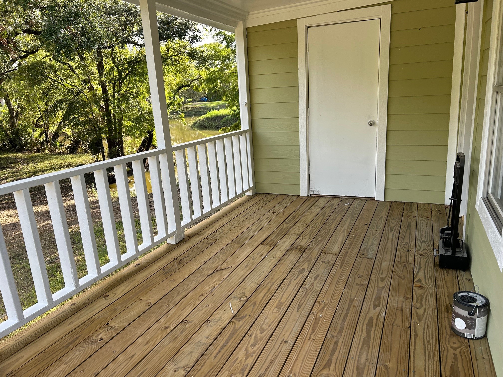 327 Bayou Road Danbury, TX 77534 - Photo 3 of 15 a view of backyard with a large window and wooden floor