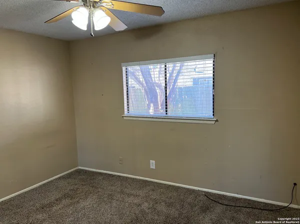 a bathroom with a toilet a sink and bathtub