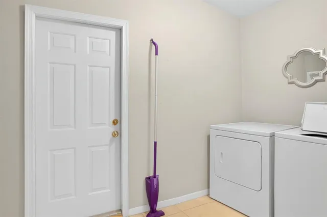 a bathroom with a sink toilet and mirror