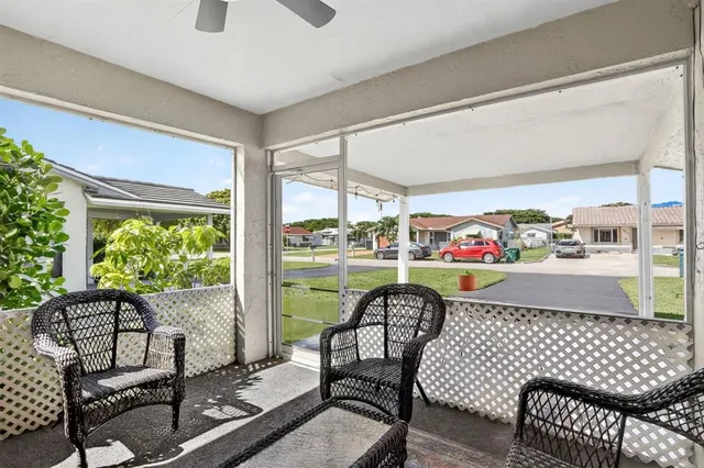 a outdoor living space with furniture and garden view