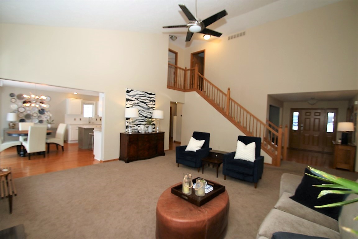 10959 Chicory Ridge Way Roscoe, IL 61073 - Photo 8 of 25 a living room with furniture and wooden floor