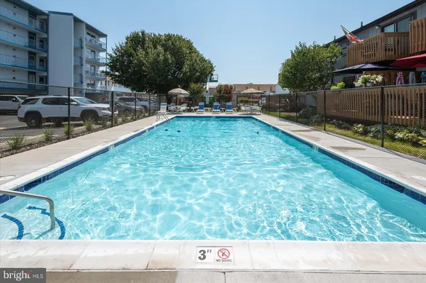 a view of outdoor space with swimming pool