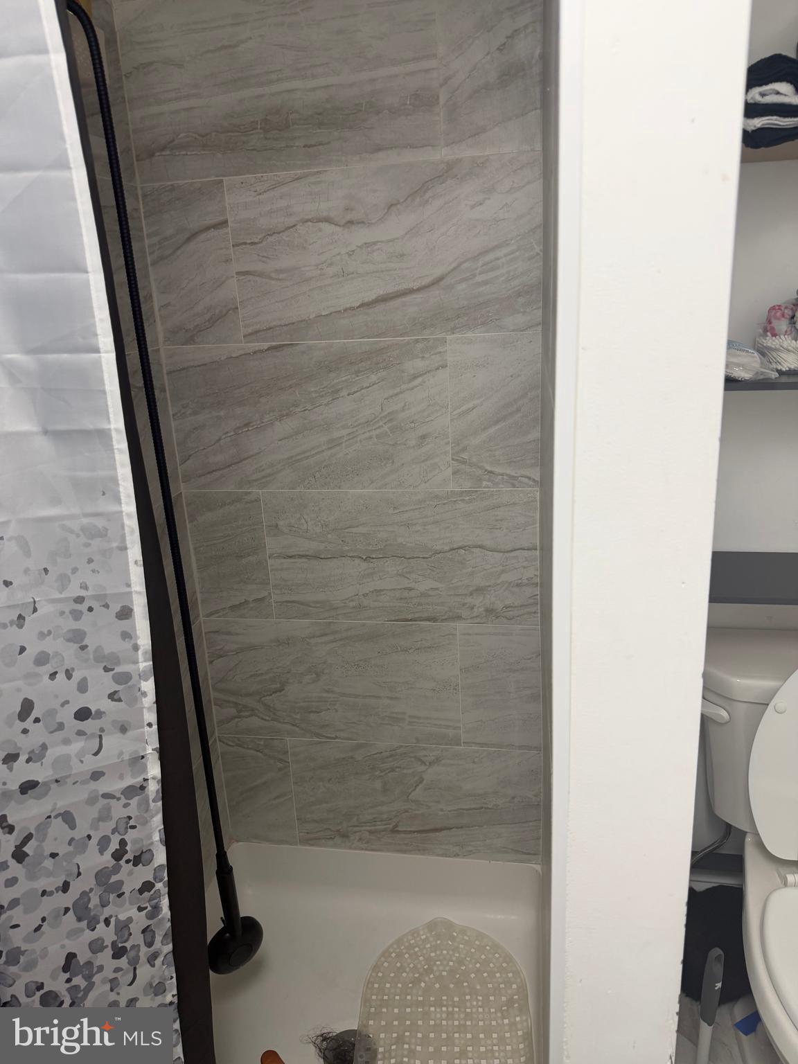 1234 Point Breeze Avenue Philadelphia, PA 19146 - Photo 12 of 15 a bathroom with a toilet and a shower