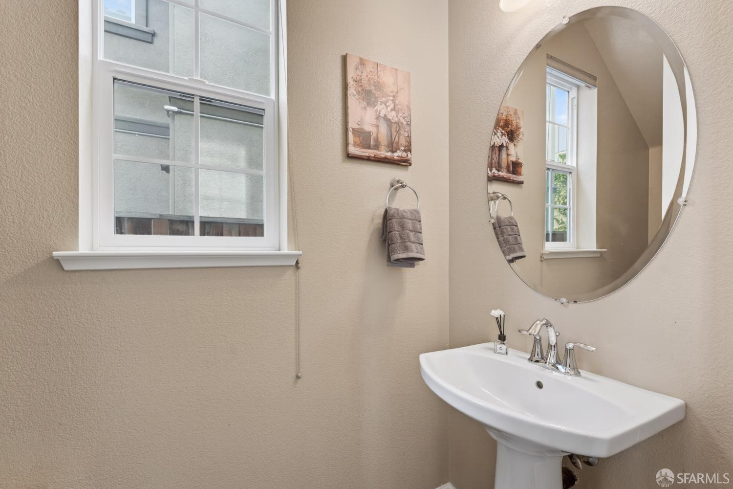 360 Gerald Circle Milpitas, CA 95035 - Photo 18 of 46 a bathroom with a sink and a mirror
