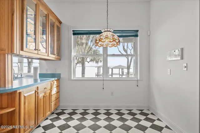 a bathroom with a shower and a sink