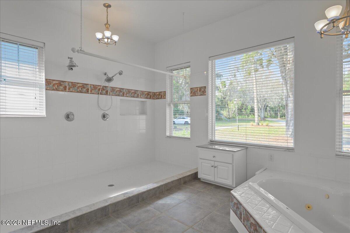 533 West River Road Palatka, FL 32177 - Photo 35 of 78 a spacious bathroom with a tub sink and a shower