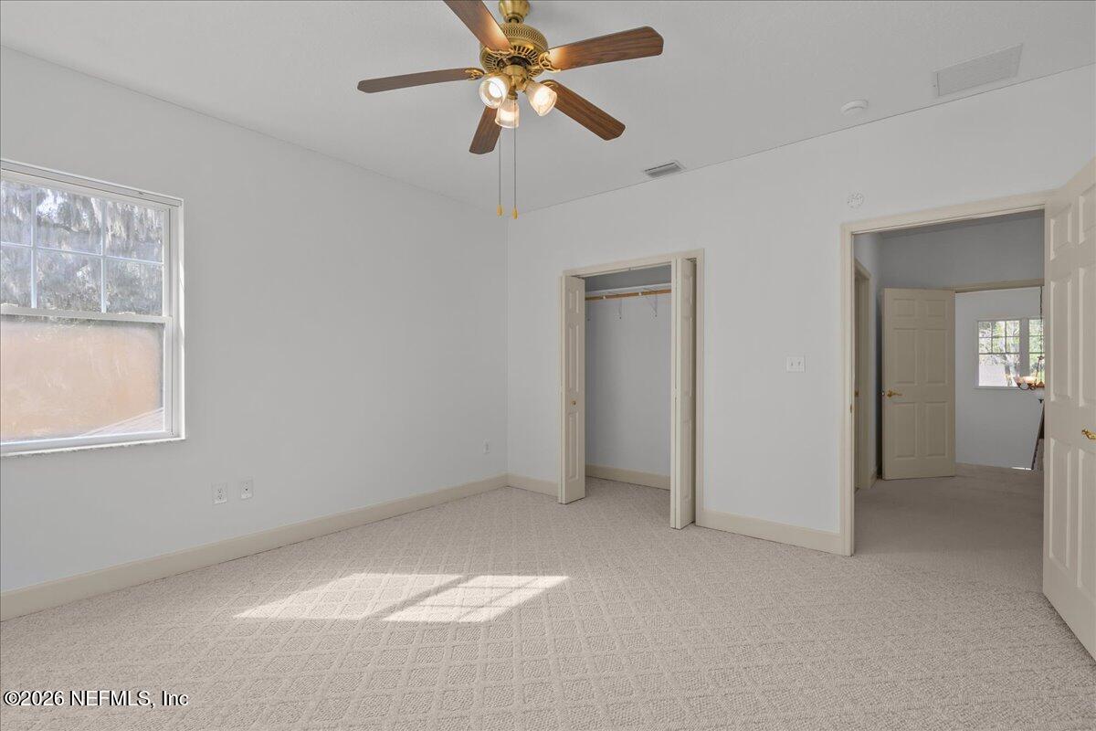533 West River Road Palatka, FL 32177 - Photo 39 of 78 a view of a room with a ceiling fan and a window