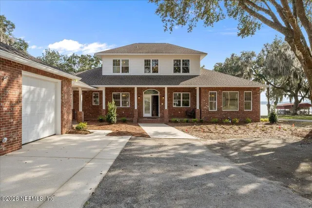 a view of entryway with wooden floor