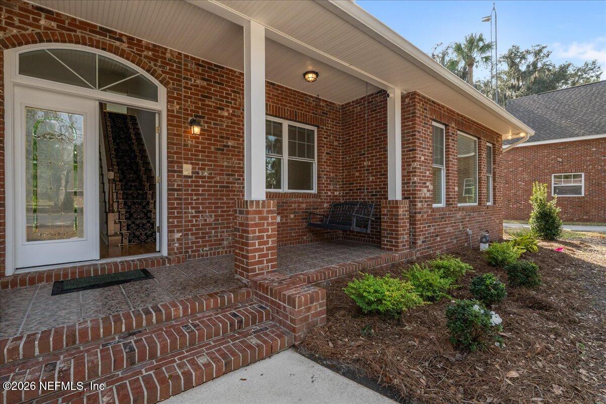 533 West River Road Palatka, FL 32177 - Photo 5 of 78 a front view of a house with garden