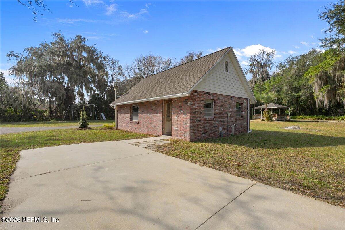 533 West River Road Palatka, FL 32177 - Photo 64 of 78 a view of a house with a yard