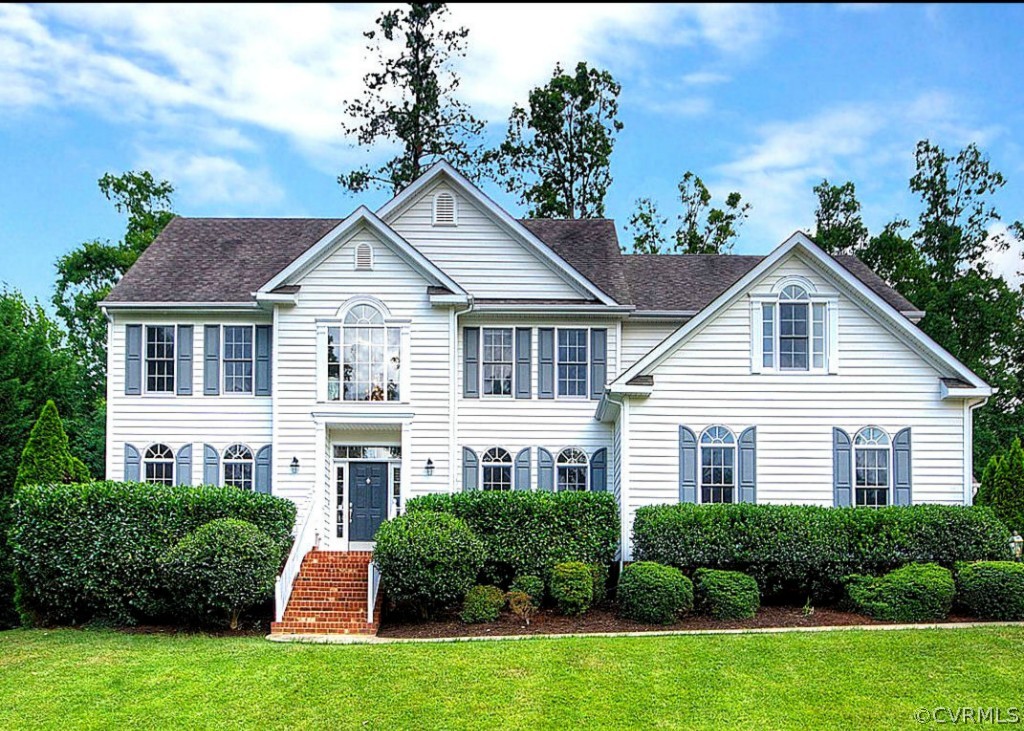 1548 Goswick Ridge Road Midlothian, VA 23114 - Photo 1 of 24 a front view of a house with a yard