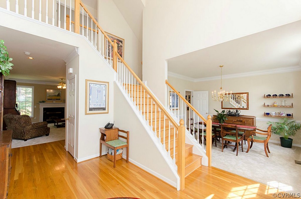 1548 Goswick Ridge Road Midlothian, VA 23114 - Photo 3 of 24 a view of a livingroom with furniture wooden floor and windows