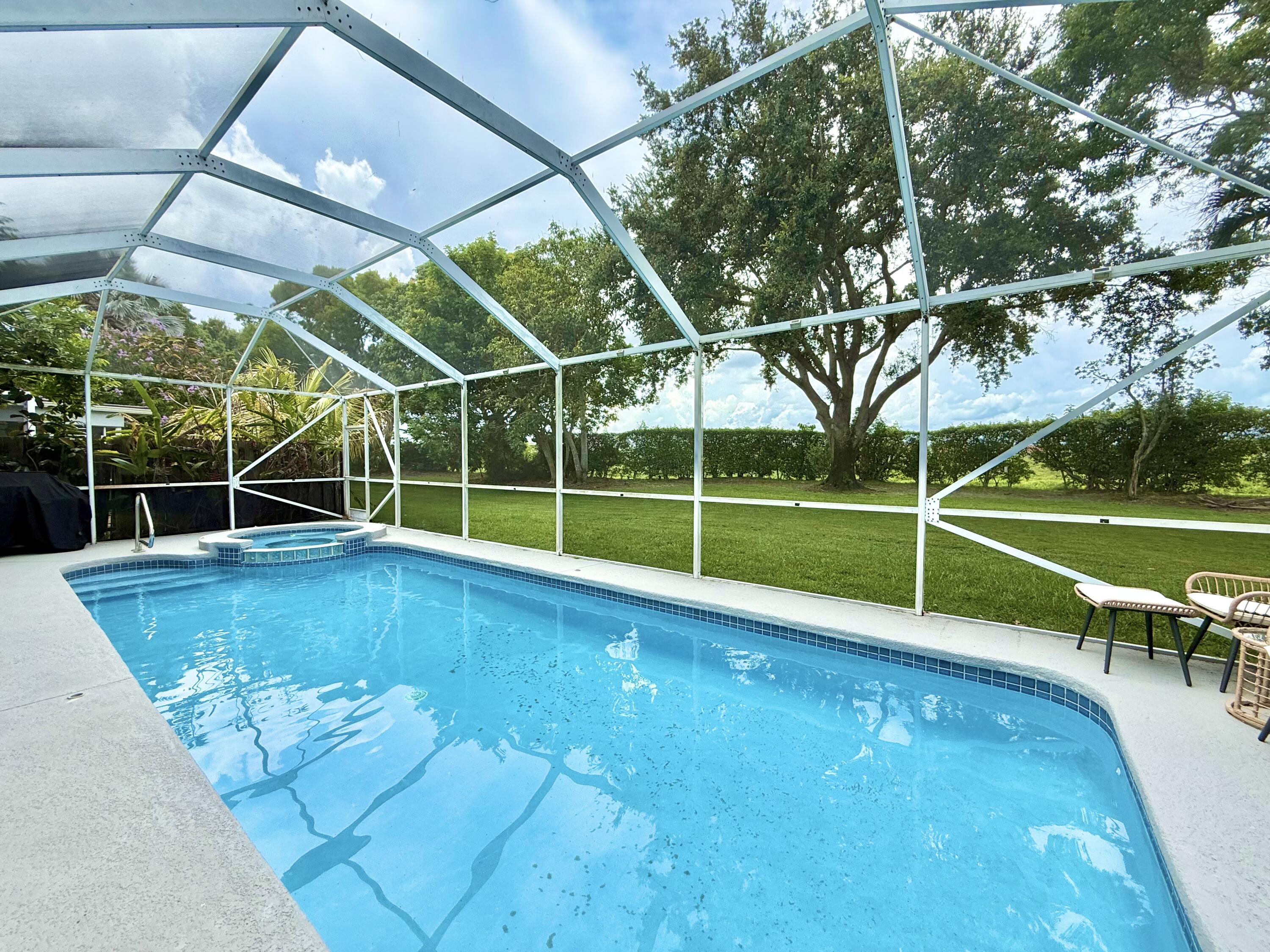 10875 Old Bridgeport Lane Boca Raton, FL 33498 - Photo 2 of 39 BEAUTIFULLY SCREENED POOL