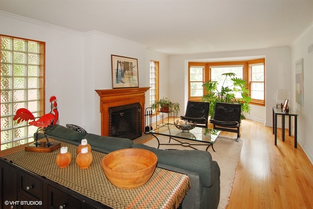 505 Nuttall Road Riverside, IL 60546 - Photo 2 of 15 a living room with furniture and a fireplace