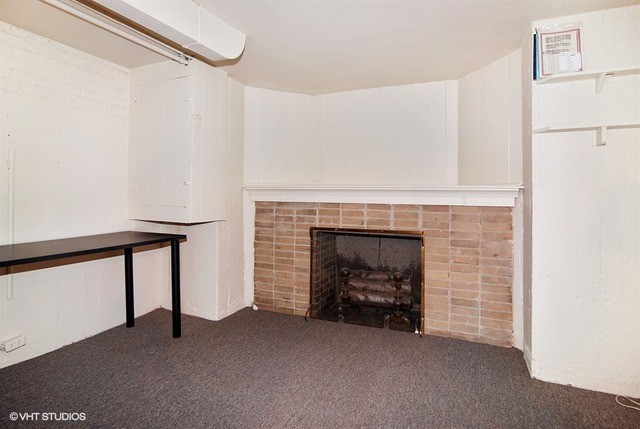 505 Nuttall Road Riverside, IL 60546 - Photo 13 of 15 a view of an empty room with fire place