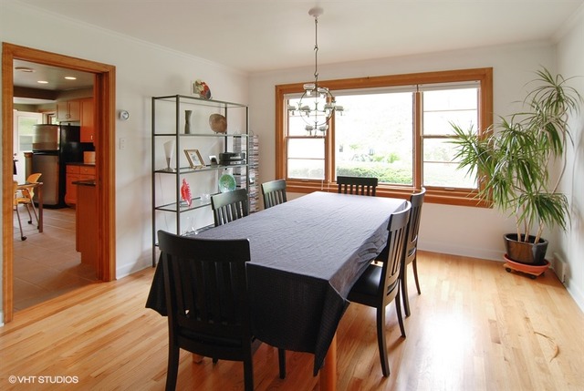 505 Nuttall Road Riverside, IL 60546 - Photo 3 of 15 a view of a dining room with furniture window and wooden floor
