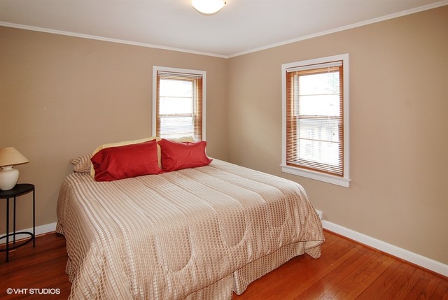 505 Nuttall Road Riverside, IL 60546 - Photo 9 of 15 a bedroom with a bed and a window