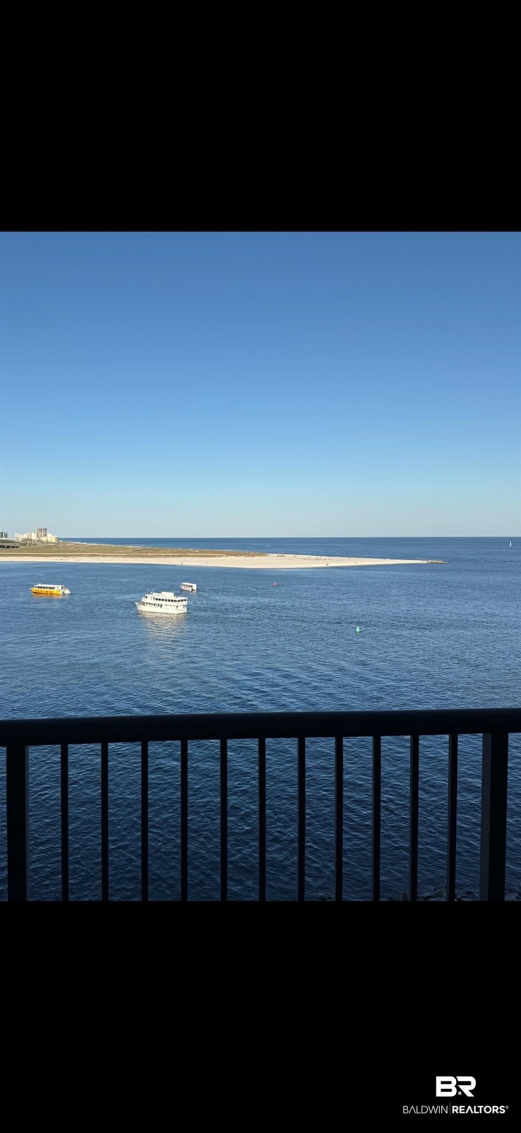 27284 Gulf Road, Unit 706 Orange Beach, AL 36561 - Photo 26 of 37 Dolphin Cruises in The Pass - From the balcony of 706