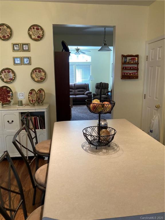 849 Dillard Road Rock Hill, SC 29730 - Photo 11 of 28 a living room with furniture and a lamp