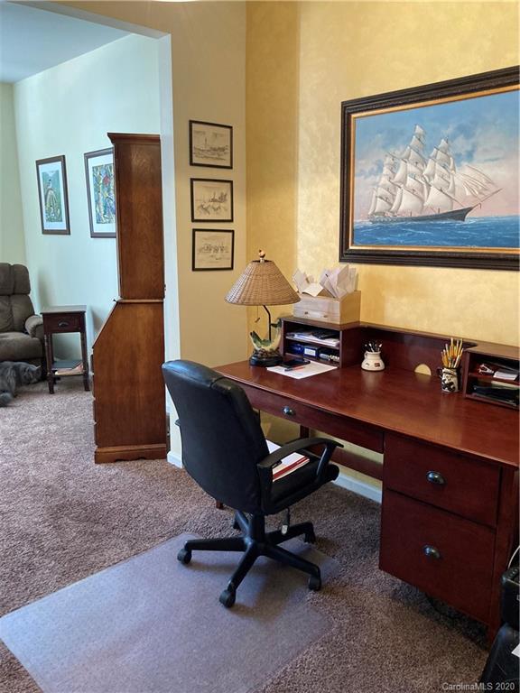 849 Dillard Road Rock Hill, SC 29730 - Photo 13 of 28 a living room with furniture and paintings on the wall