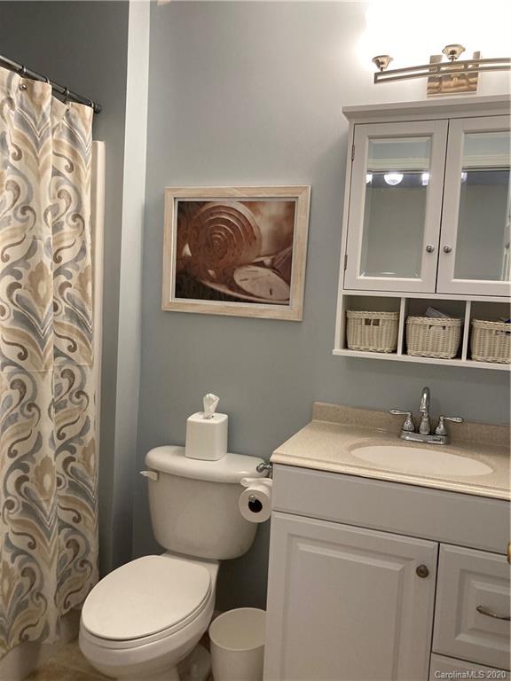 849 Dillard Road Rock Hill, SC 29730 - Photo 19 of 28 a bathroom with a toilet sink and mirror