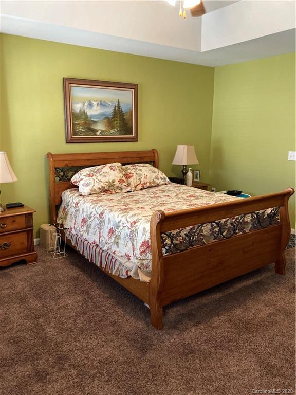 849 Dillard Road Rock Hill, SC 29730 - Photo 21 of 28 a bed sitting in a bedroom next to a wall