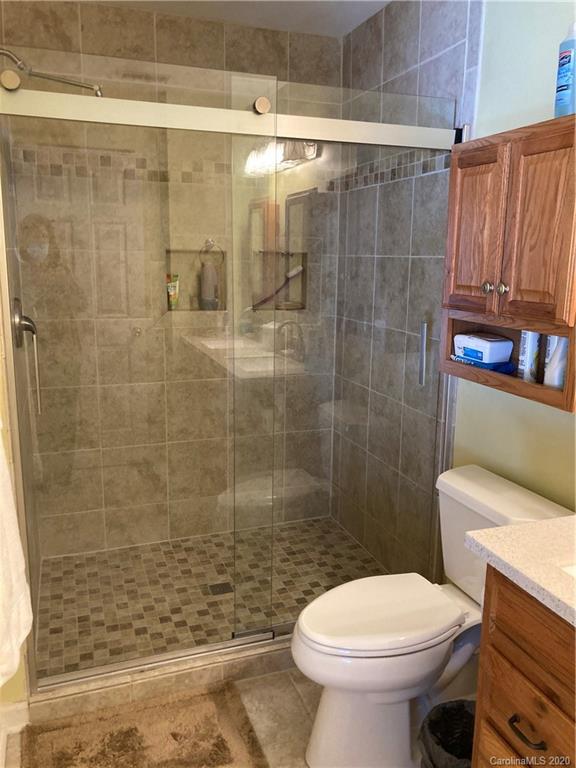 849 Dillard Road Rock Hill, SC 29730 - Photo 23 of 28 a bathroom with a toilet and a shower