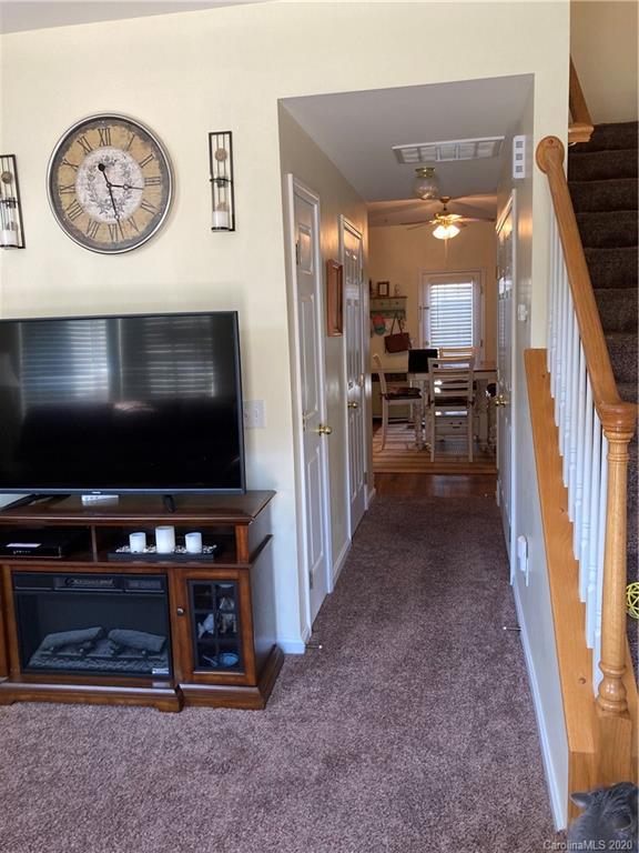 849 Dillard Road Rock Hill, SC 29730 - Photo 4 of 28 a view of a livingroom with furniture and a flat screen tv