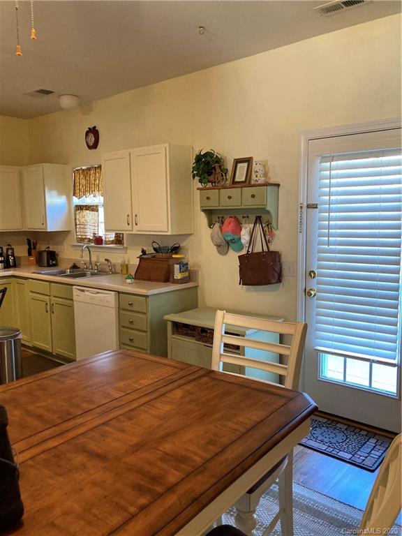 849 Dillard Road Rock Hill, SC 29730 - Photo 10 of 28 a kitchen with a sink cabinets and window