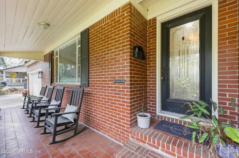 a view of a outdoor seating area with furniture