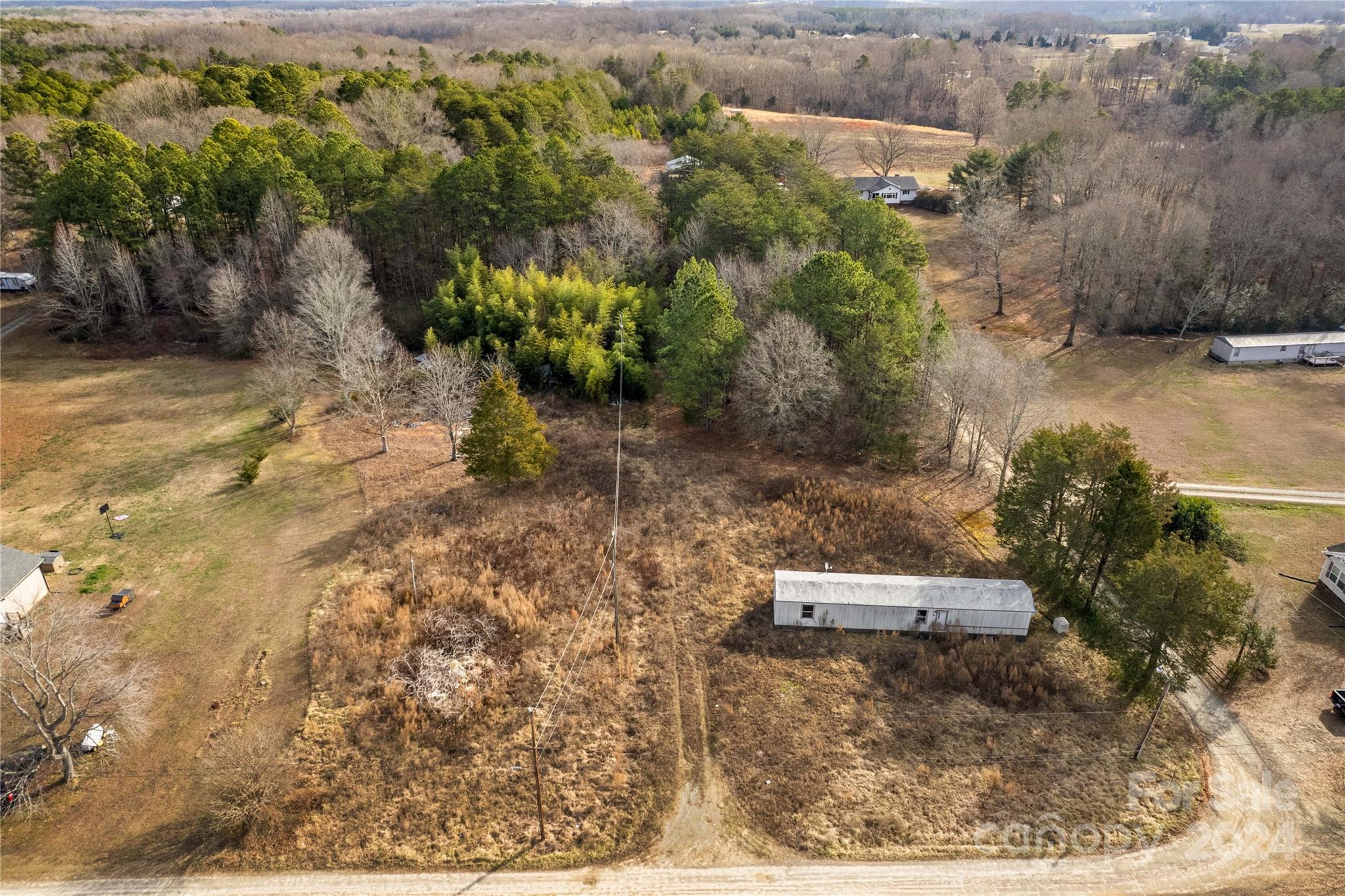 0 Warren Drive Mount Ulla, NC 28125 - Photo 19 of 20 a backyard of a house with a yard and lake view