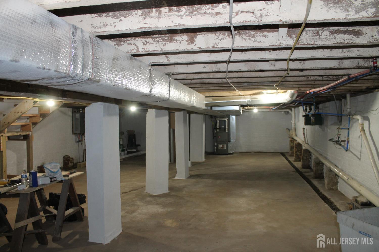 519 Roosevelt Avenue, Unit 2 Carteret, NJ 07008 - Photo 17 of 17 a view of an empty room with wooden roof