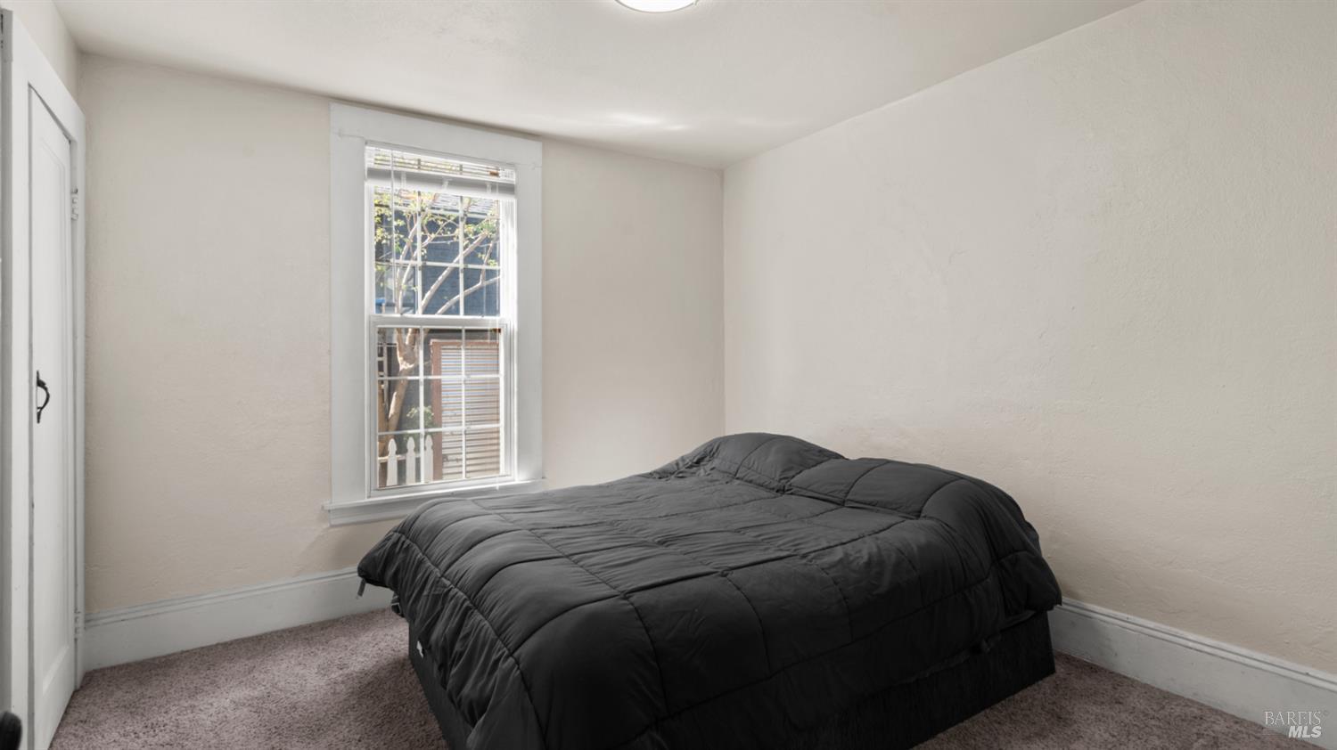 125 Kendal Street Vacaville, CA 95688 - Photo 18 of 45 a bedroom with a bed and a window