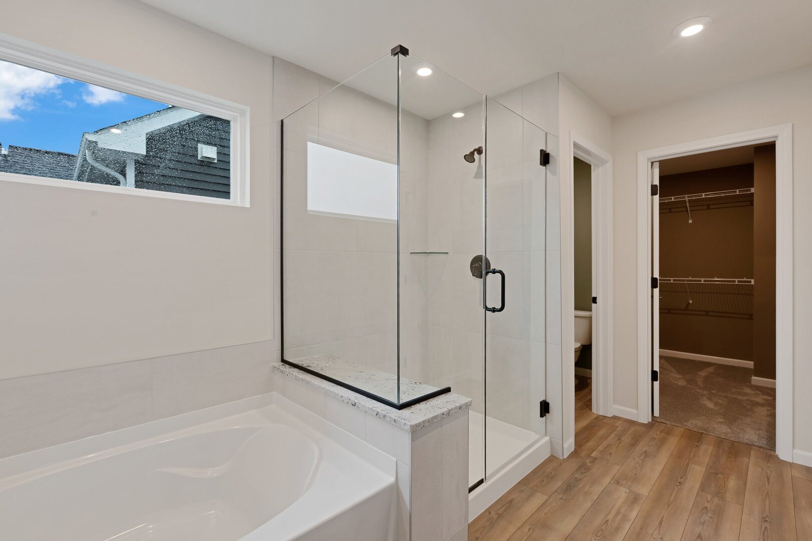 2539 Tailshot Road Plainfield, IL 60585 - Photo 12 of 14 a bathroom with a shower and a glass door