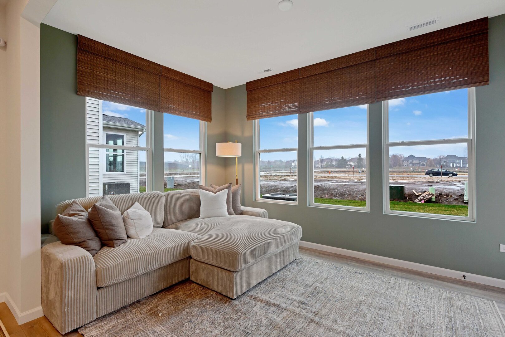 2539 Tailshot Road Plainfield, IL 60585 - Photo 10 of 14 a living room with furniture and a large window