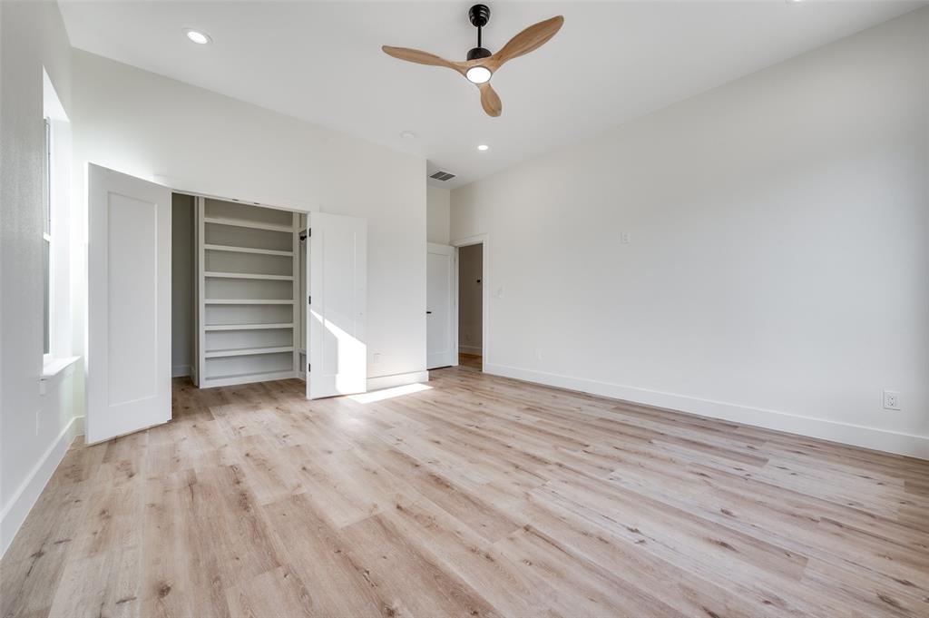 407 Bobbie Street Dallas, TX 75203 - Photo 17 of 25 wooden floor in an empty room