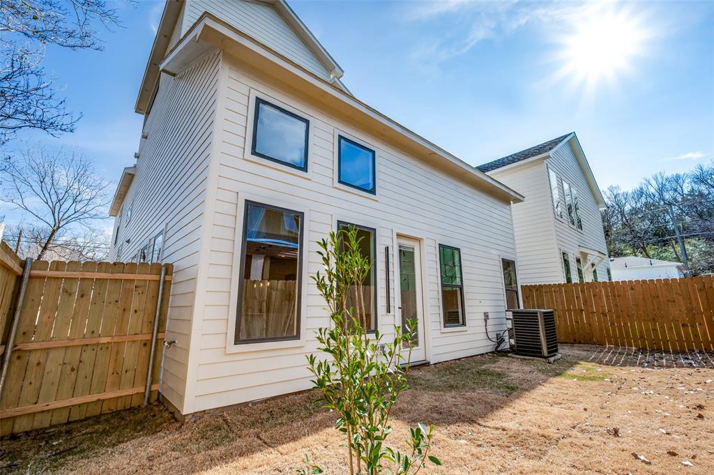 407 Bobbie Street Dallas, TX 75203 - Photo 25 of 25 a view of a house with a yard