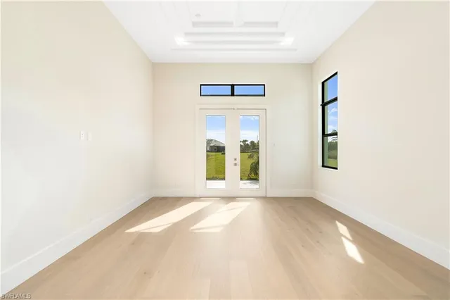 a view of an empty room with window
