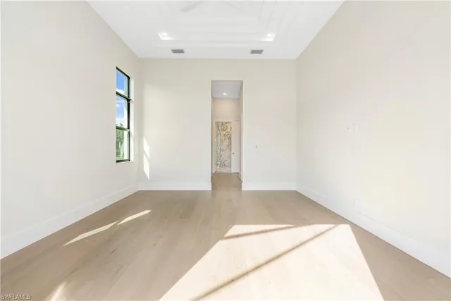 an empty room with windows