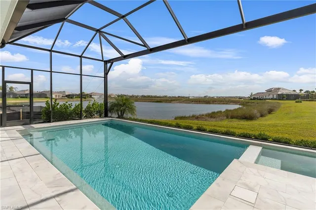 a view of a swimming pool and an ocean view
