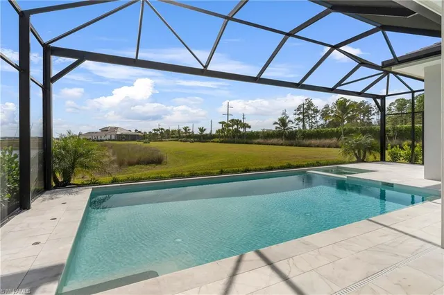 a view of swimming pool with a yard