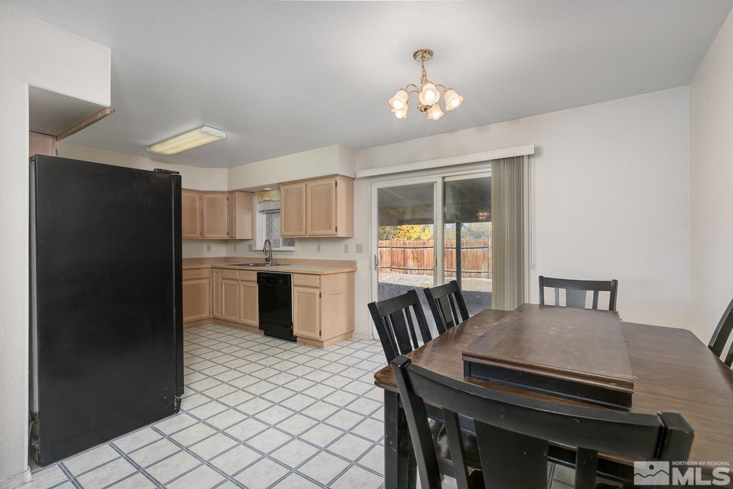 1300 Lattin Road Fallon, NV 89406 - Photo 6 of 26 a view of a dining room with furniture